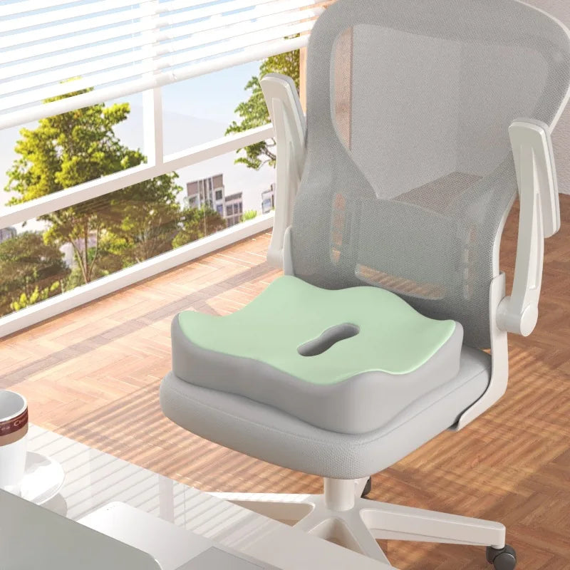 Green Easely memory foam seat cushion on a white office chair
